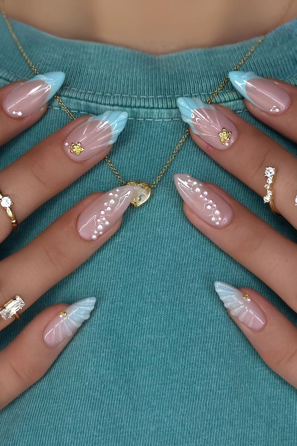 Light blue French nails with mermaid-core accents