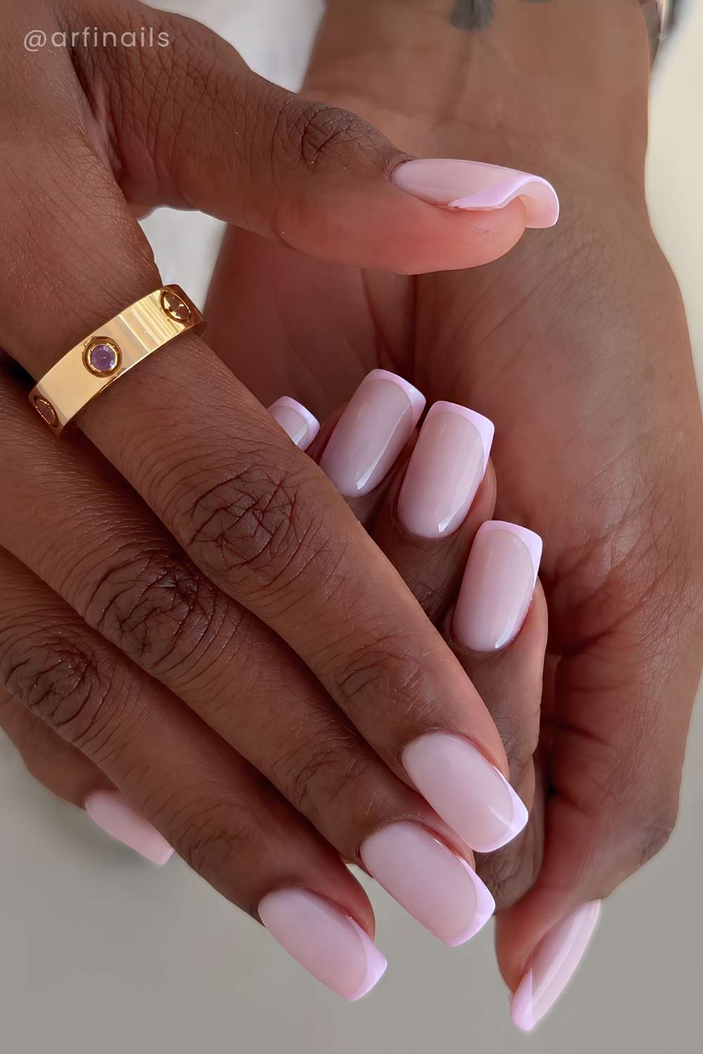 Light pink on pink French manicure