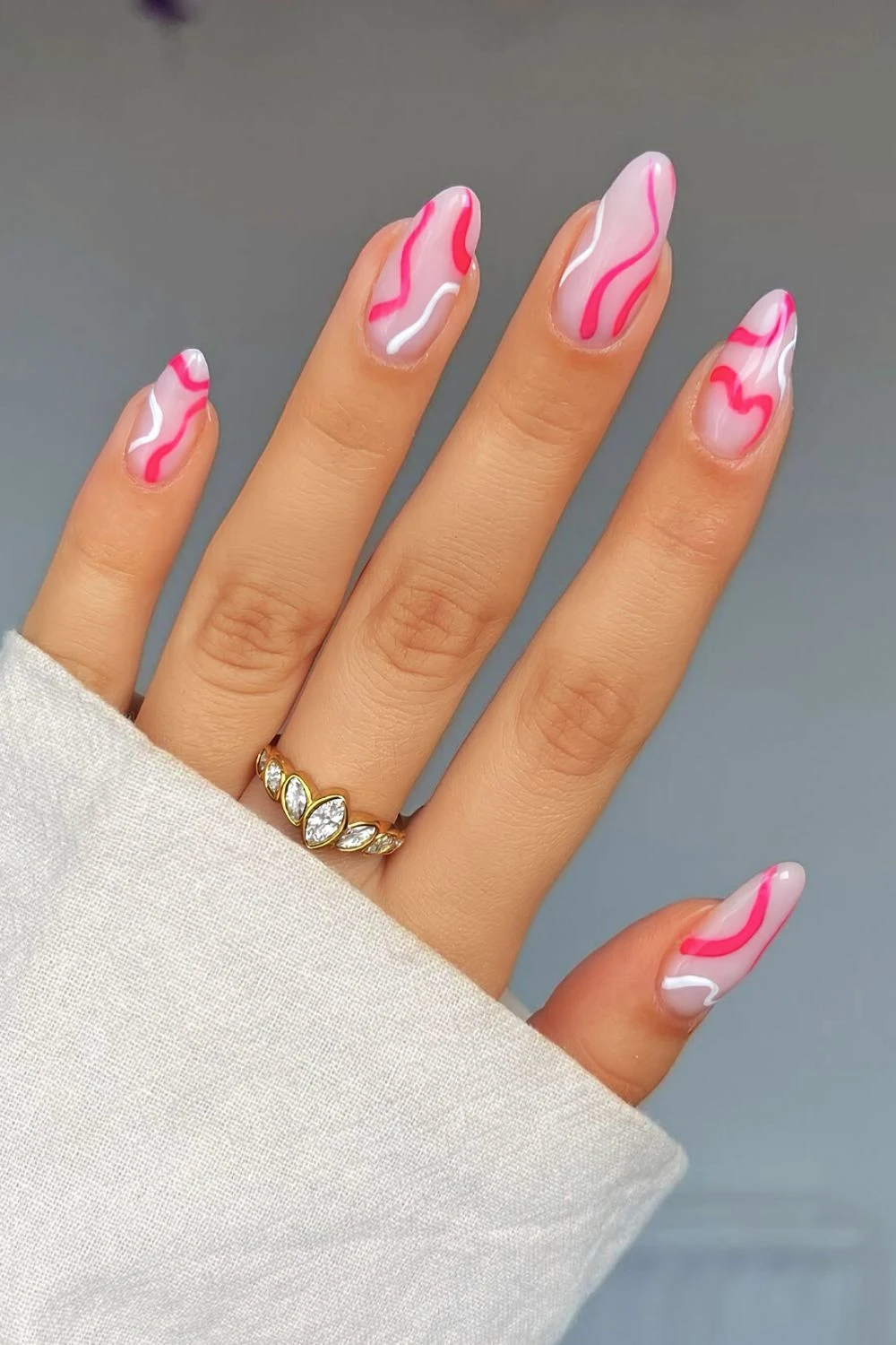 Milky mani with hot pink, bubblegum and white swirls