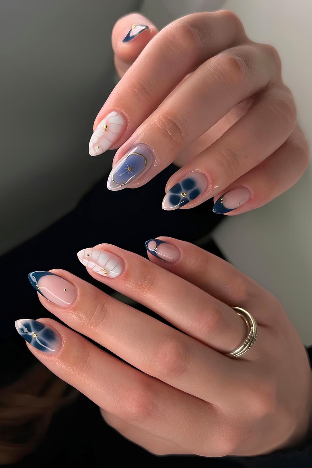 Navy blue and white mani with blooming flowers