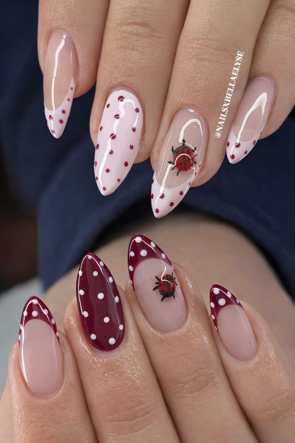 Pink and burgundy nails with ladybugs and dots