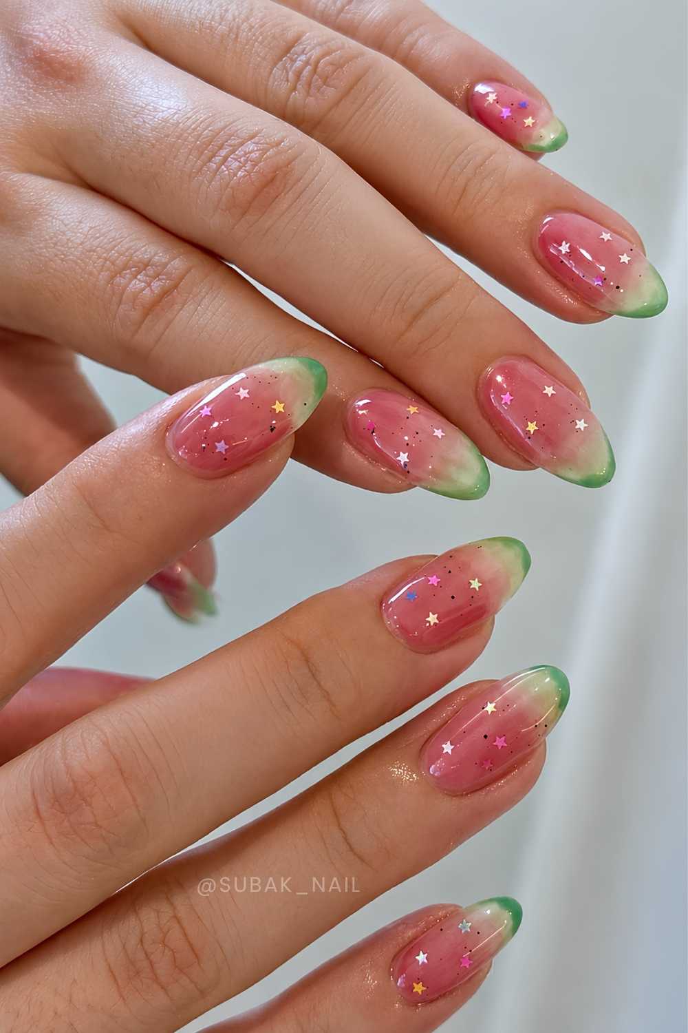 Pink and green watermelon nails with star art