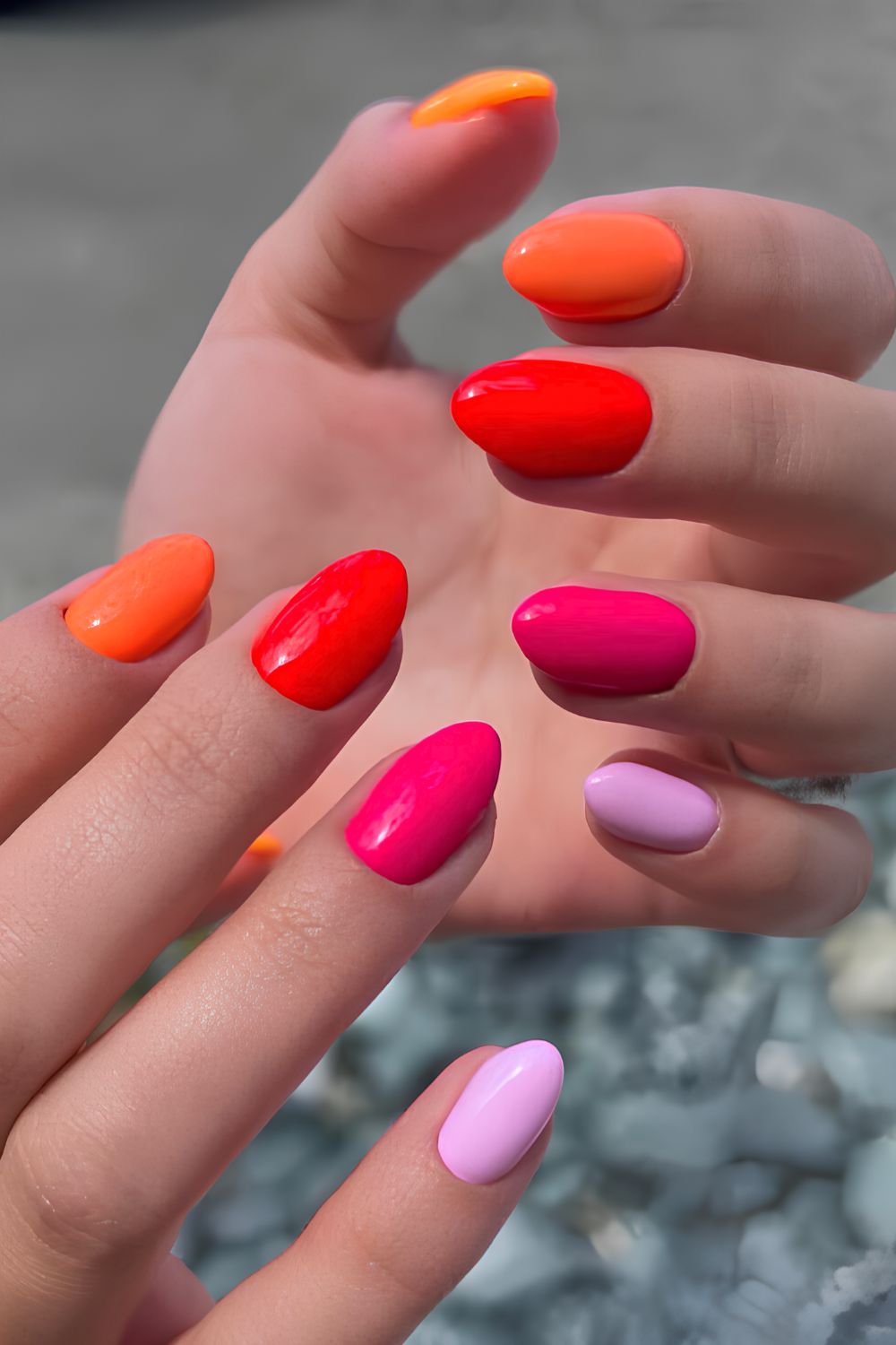 Pink and orange skittle manicure
