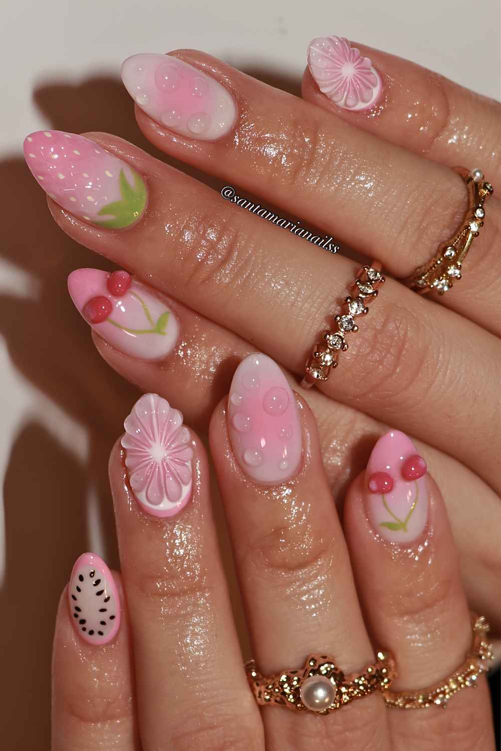 Pink mani with textured fruit art