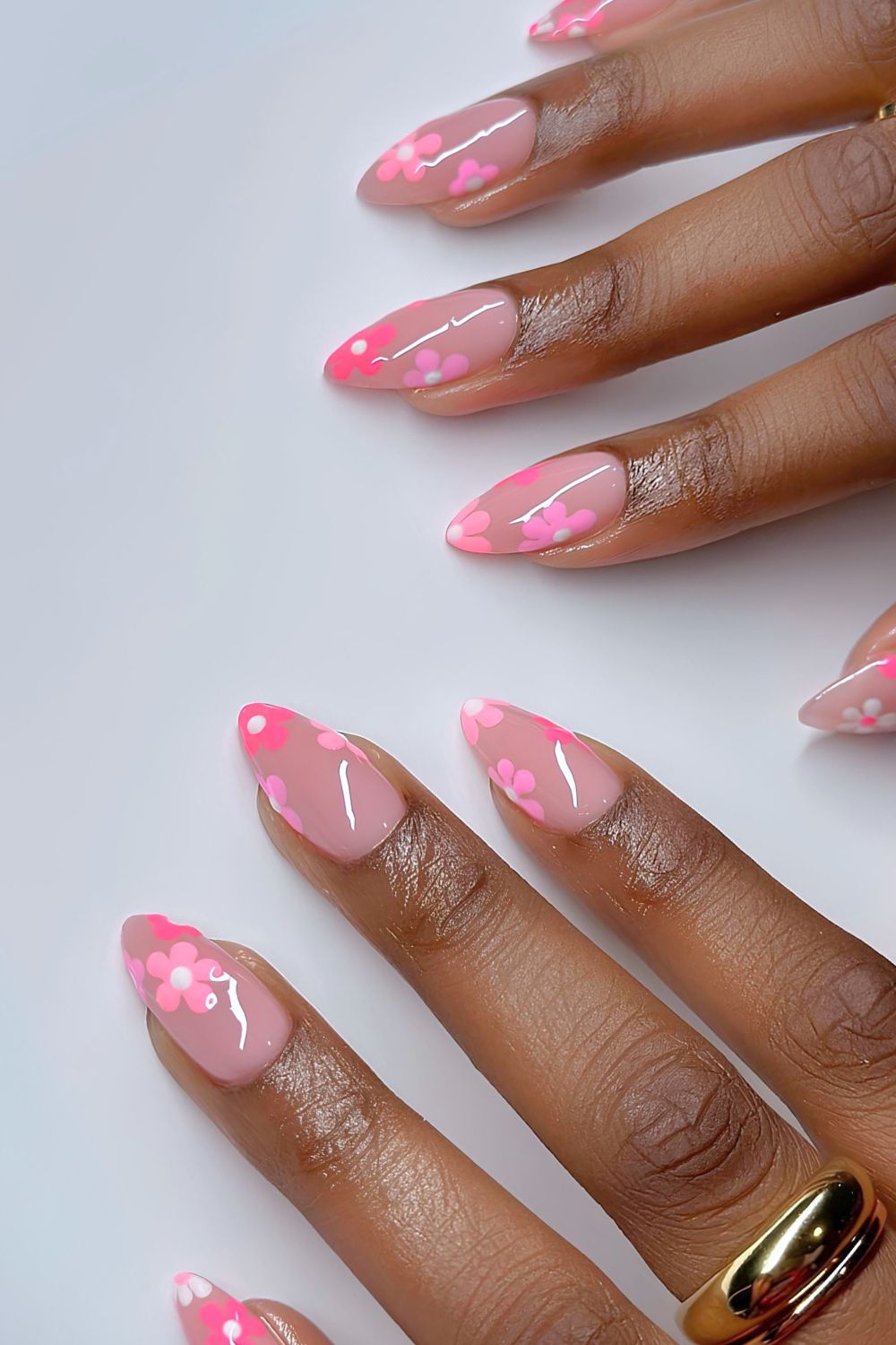 Pink nails with floral tips