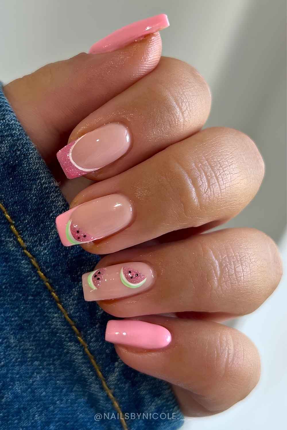 Pink nails with glitter and micro watermelons