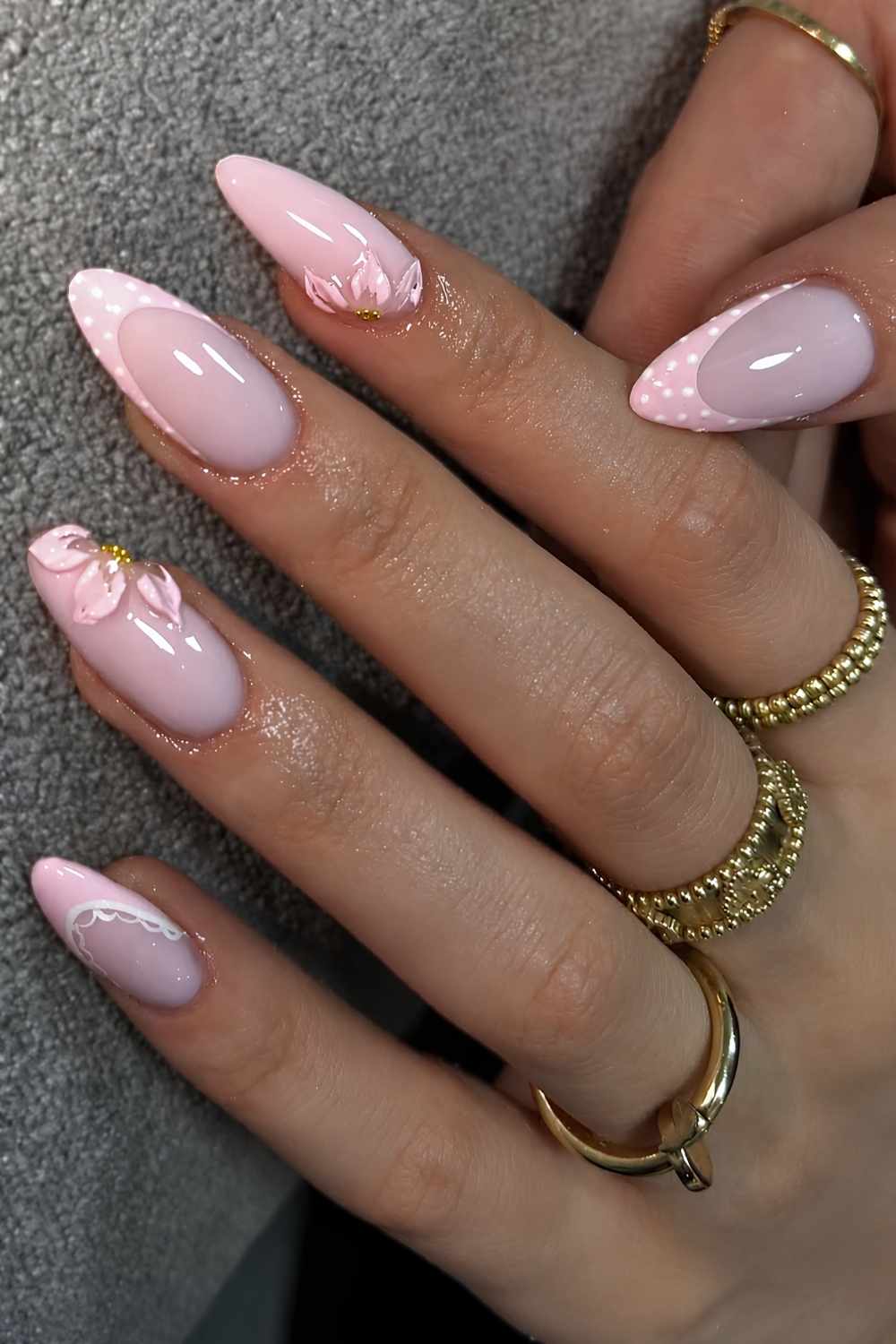 Pink on pink French nails with dots and flowers