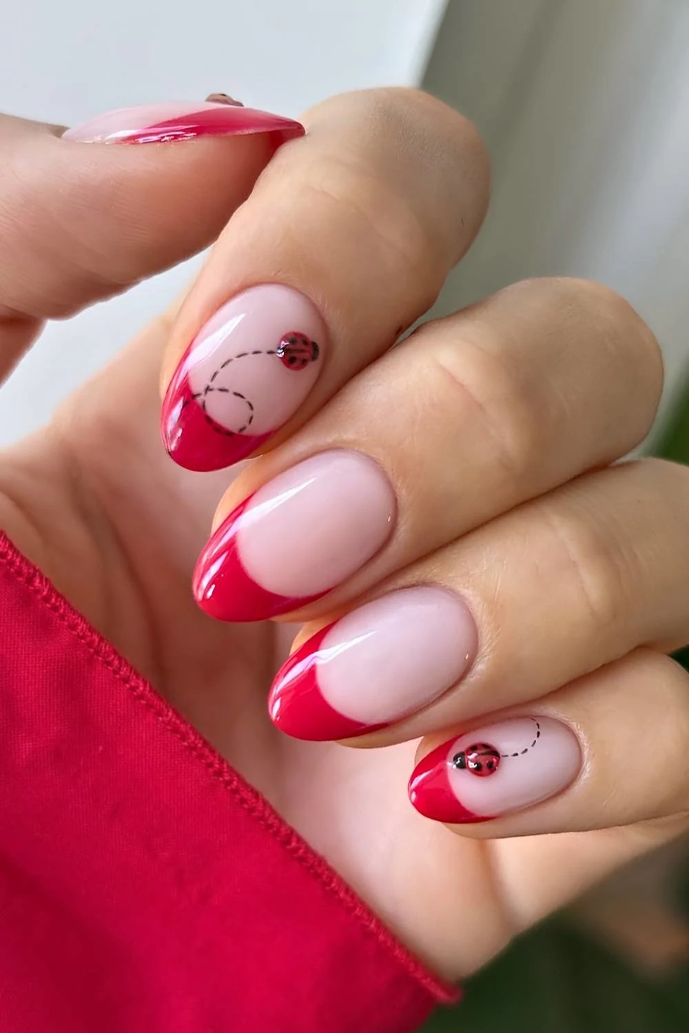 Red French tips with accent ladybugs