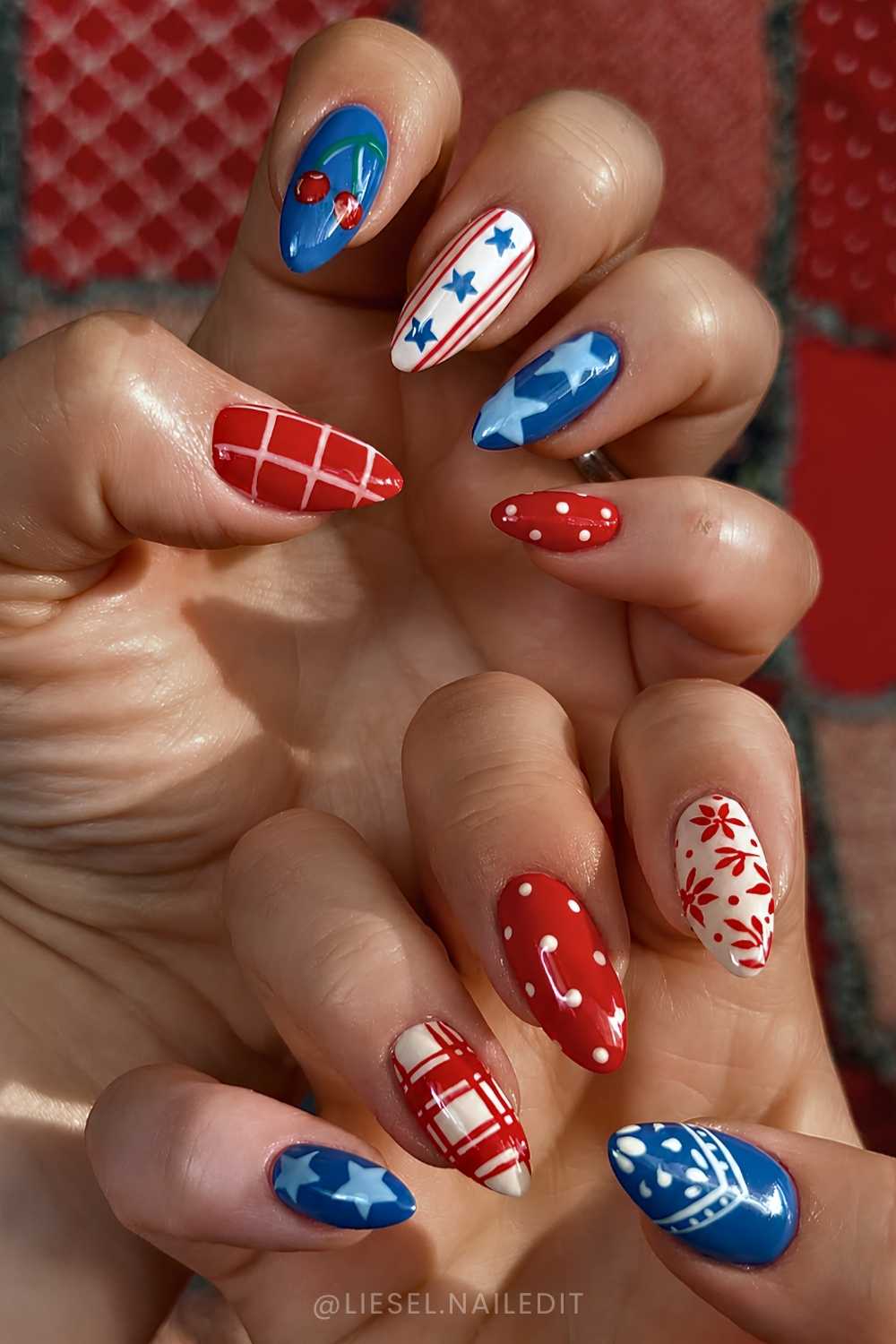 Red and blue mani with stars dots and flowers