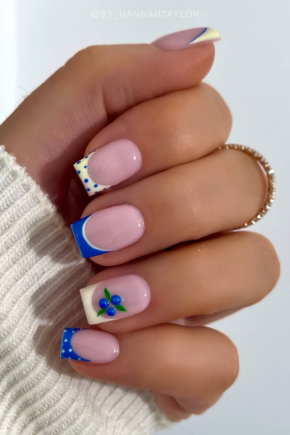 Royal blue and yellow nails with bluberries