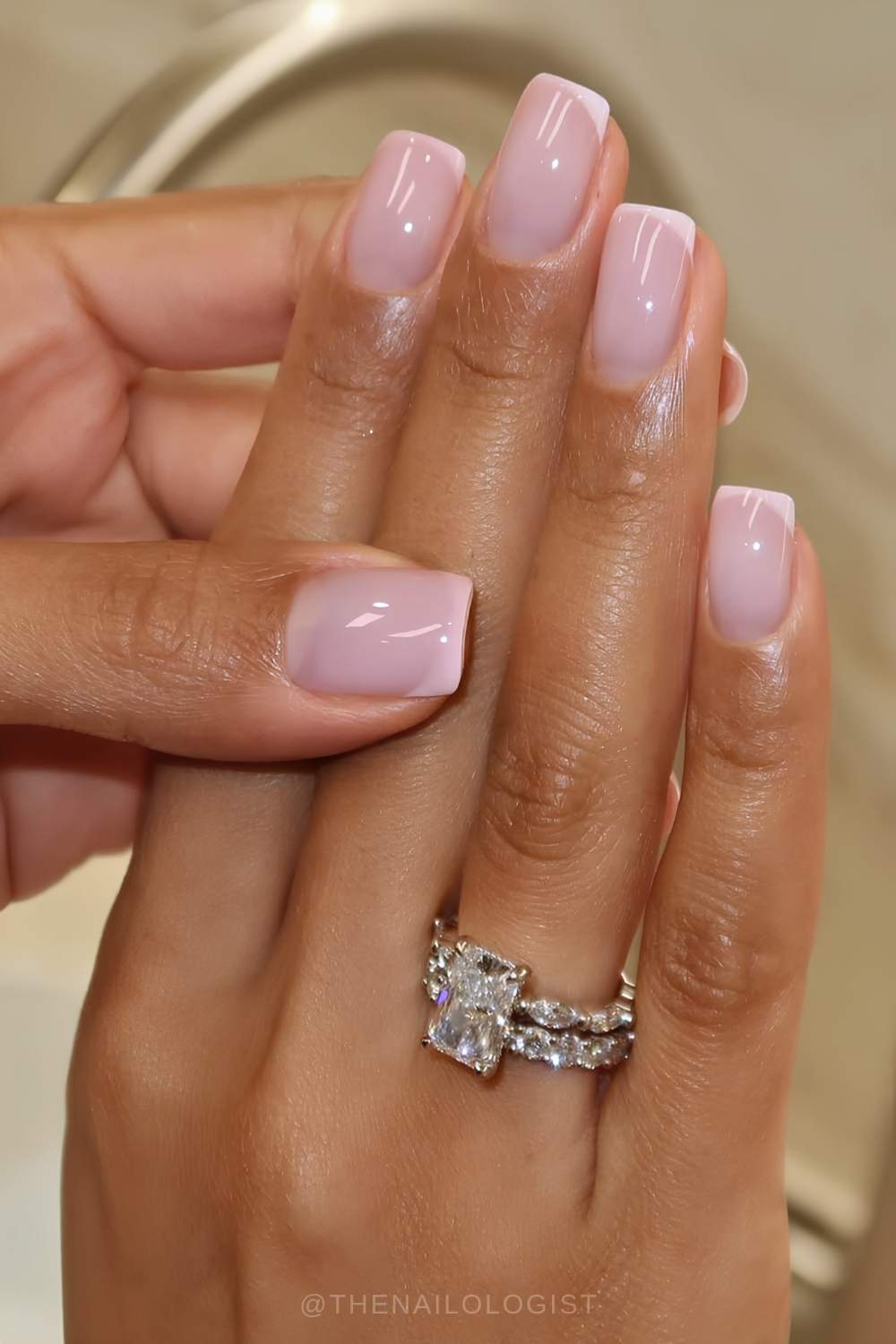Short light pink French nails