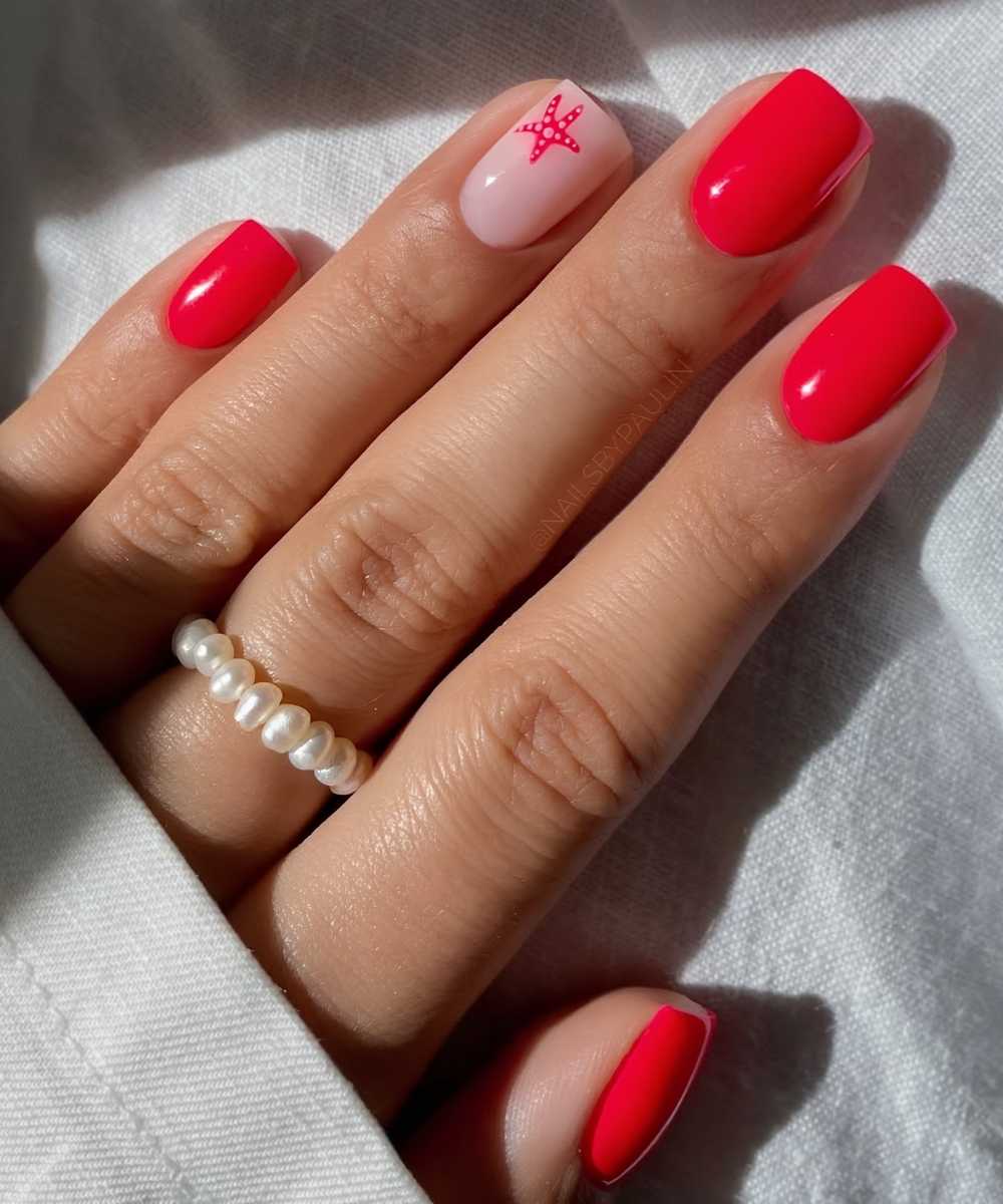 Short red mani with micro starfish art