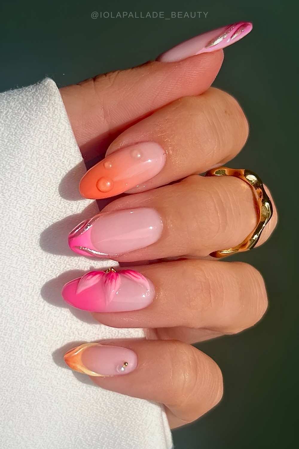 Sunset mani with flowers and textured droplets