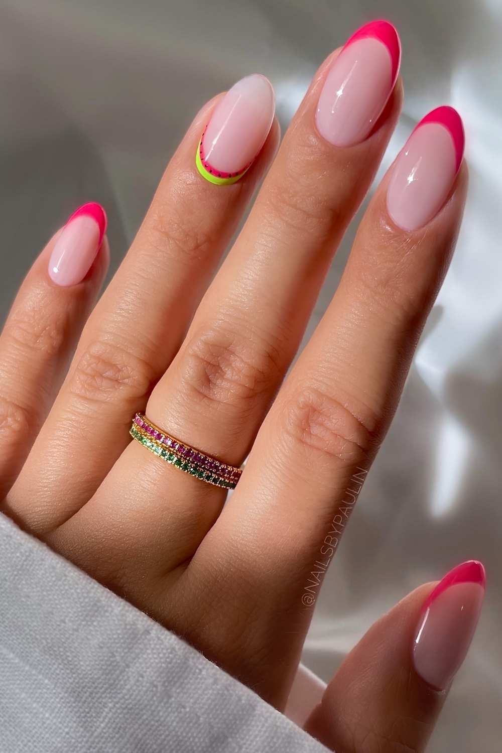 Vibrant pink French mani with watermelon accent