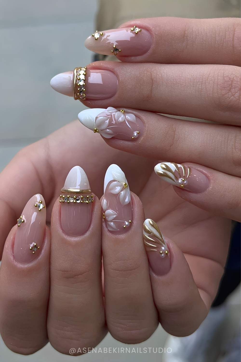 White French tips with gold bangles and 3d flowers
