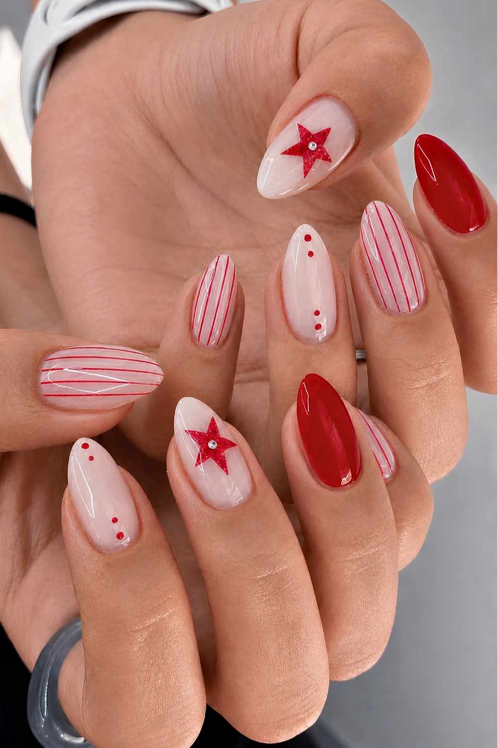 White and red nails with stripes and stars