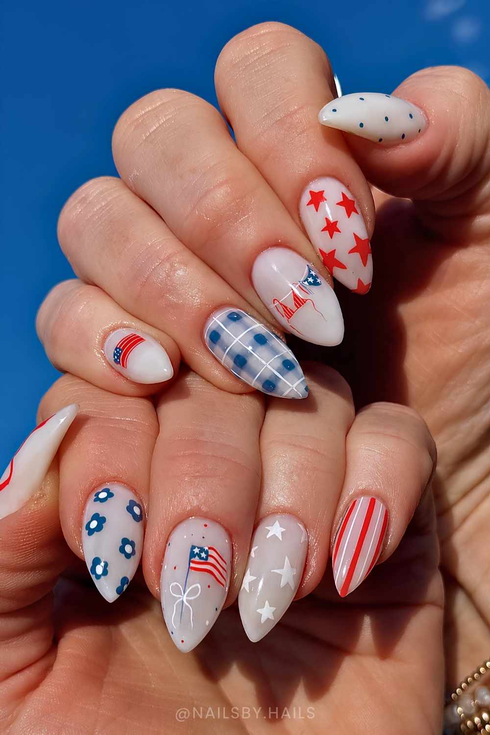 White nails with red and blue 4th of july art