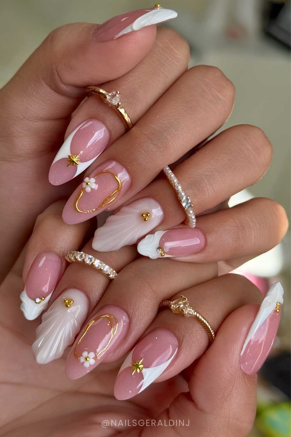 White summer nails with gold details and shell art