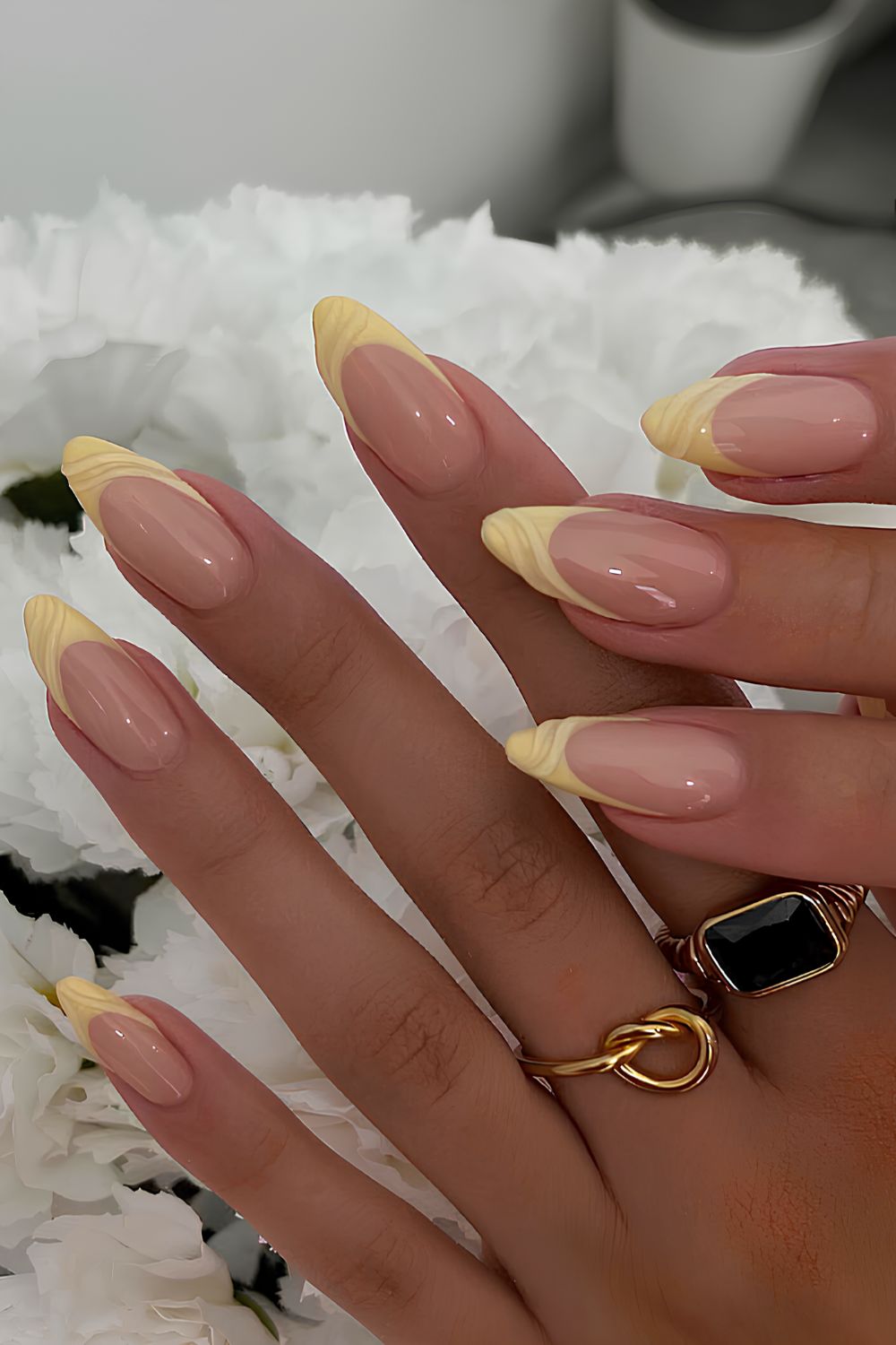 Yellow French mani with textured swirls