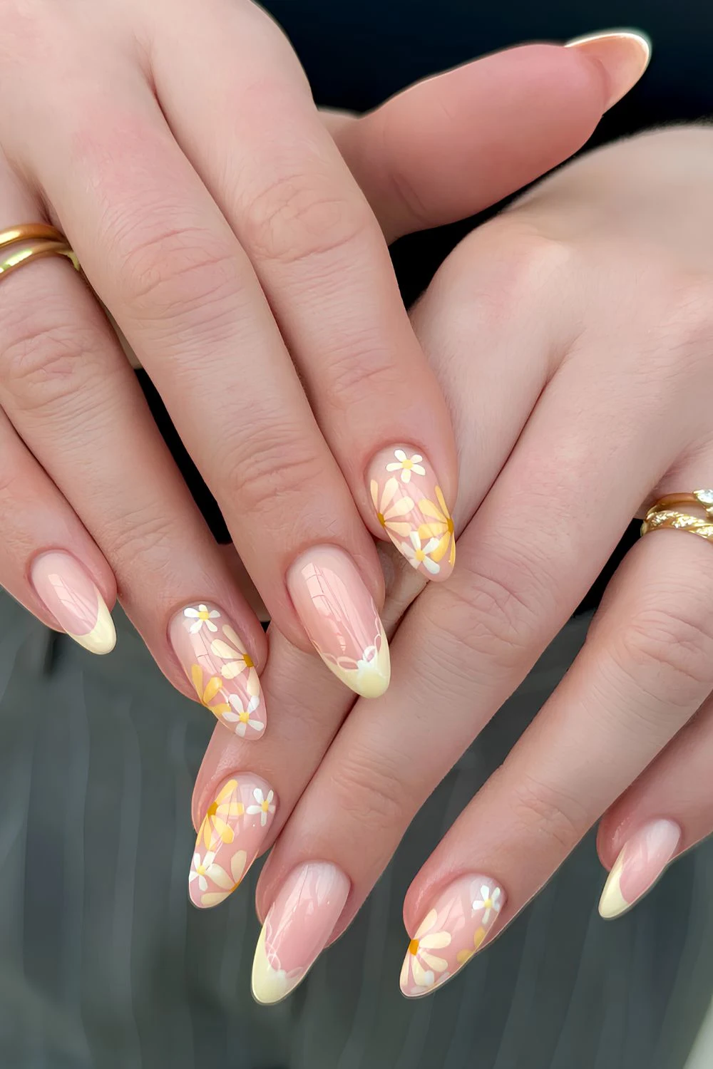 Yellow French nails with flowers and bows