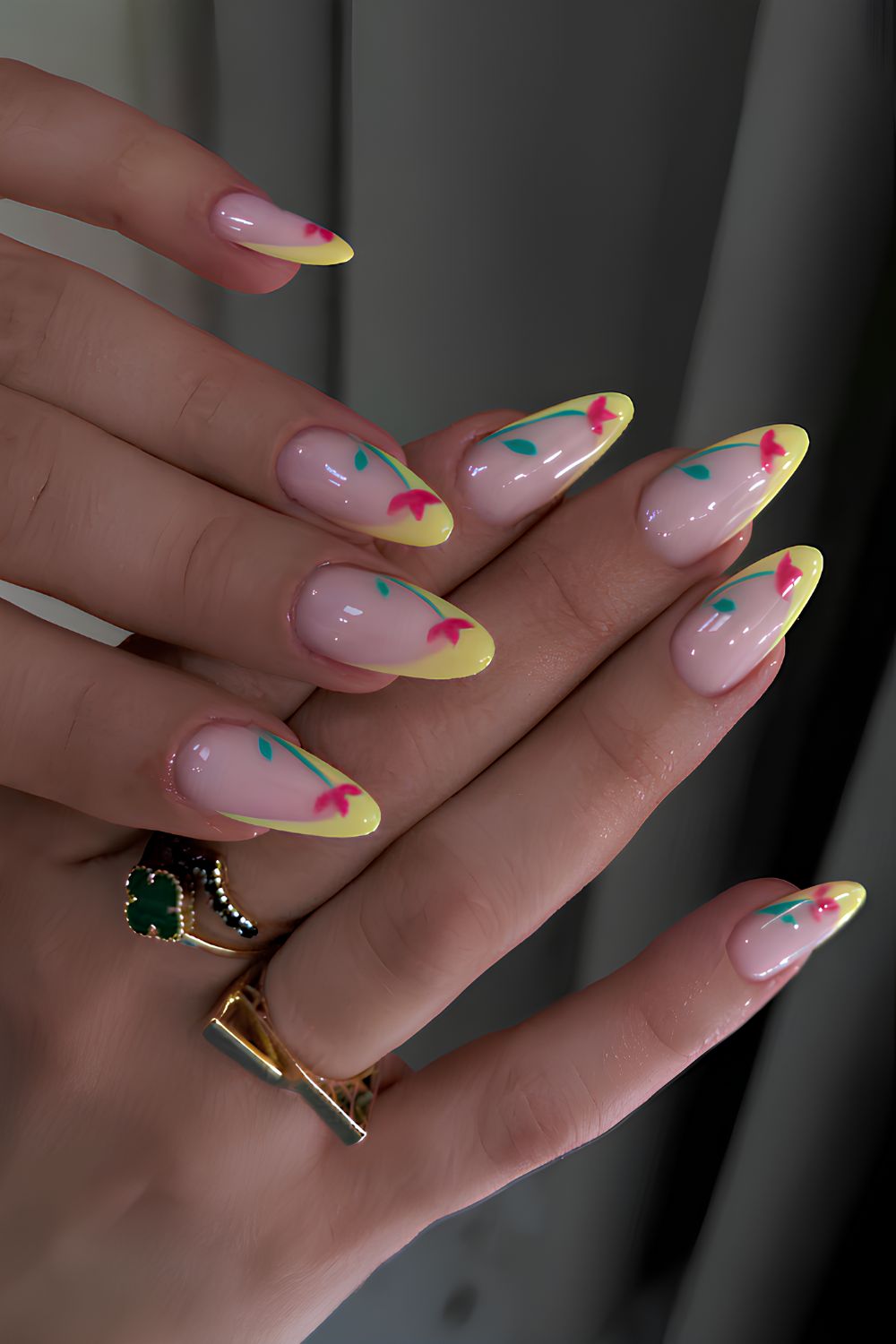 Yellow French nails with red tulip art
