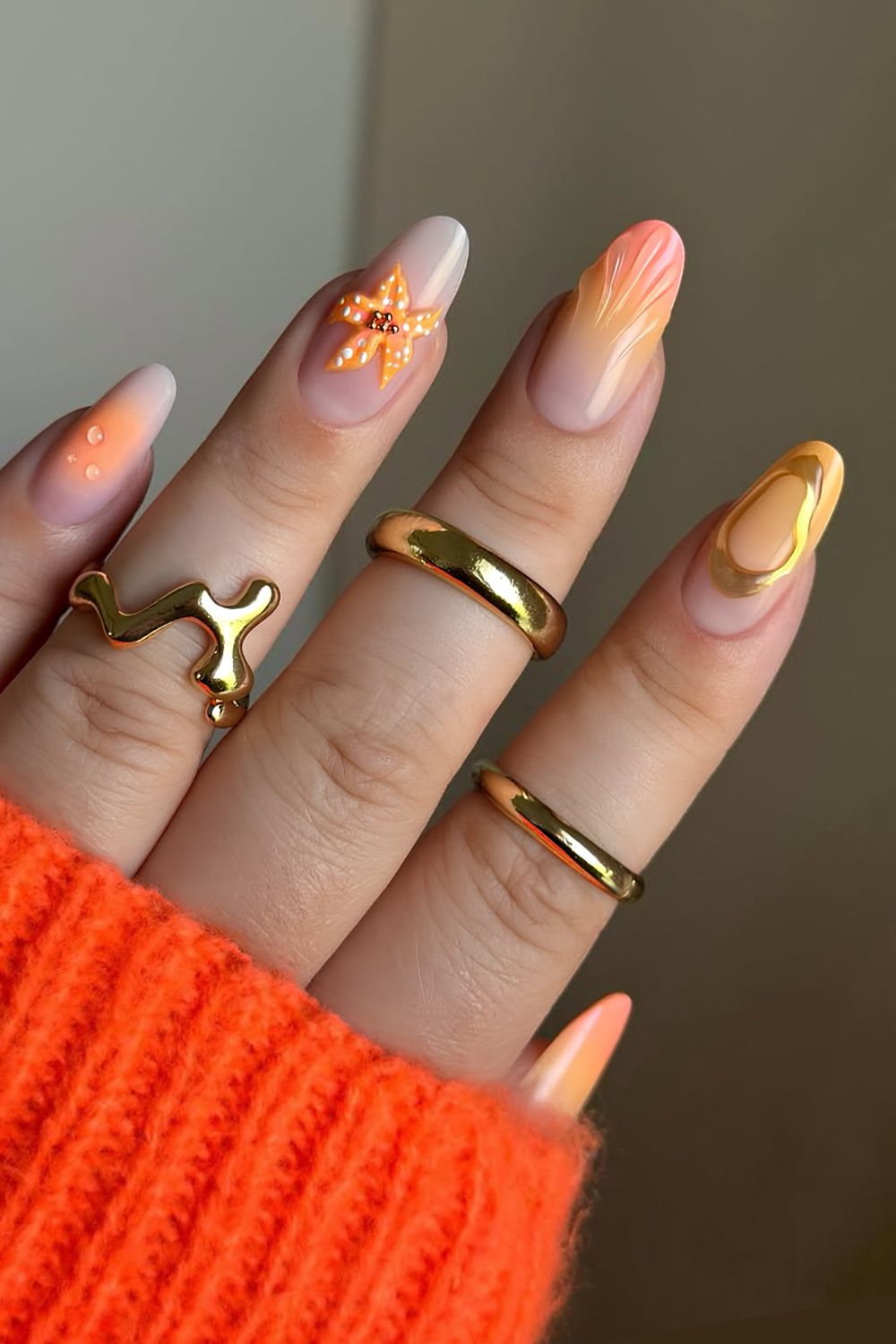 Yellow and orange mani with chrome and textured details