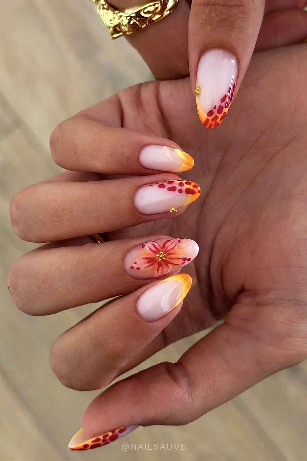 Yellow and red mani with animal print and flowers