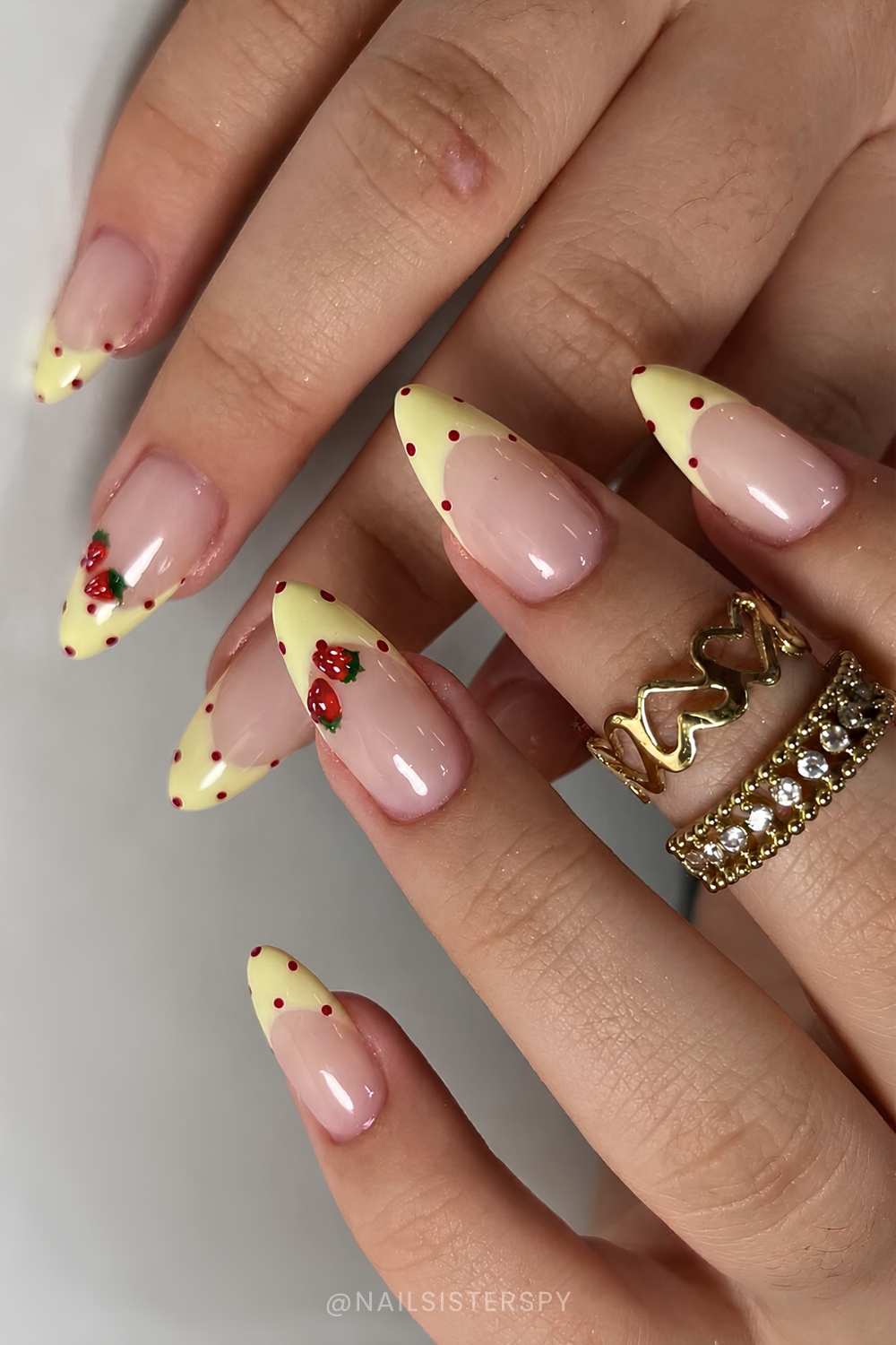 Yellow polka dot French mani with strawberries
