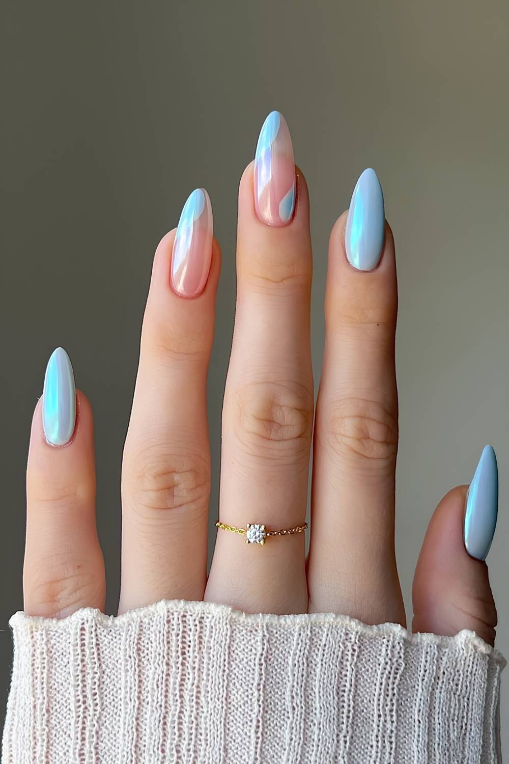 Blue chrome nails with negative space design