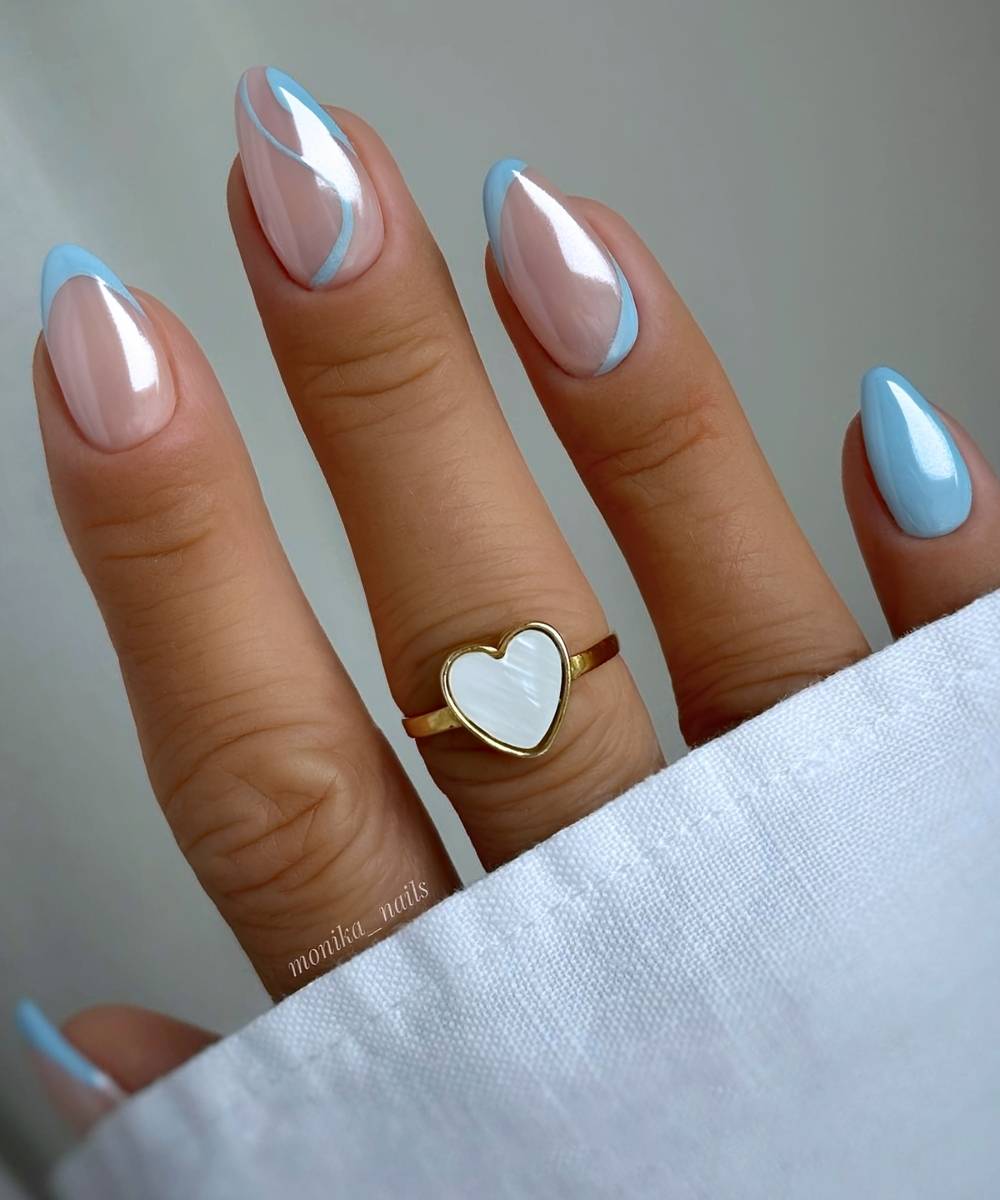 Blue chrome nails with swirl art