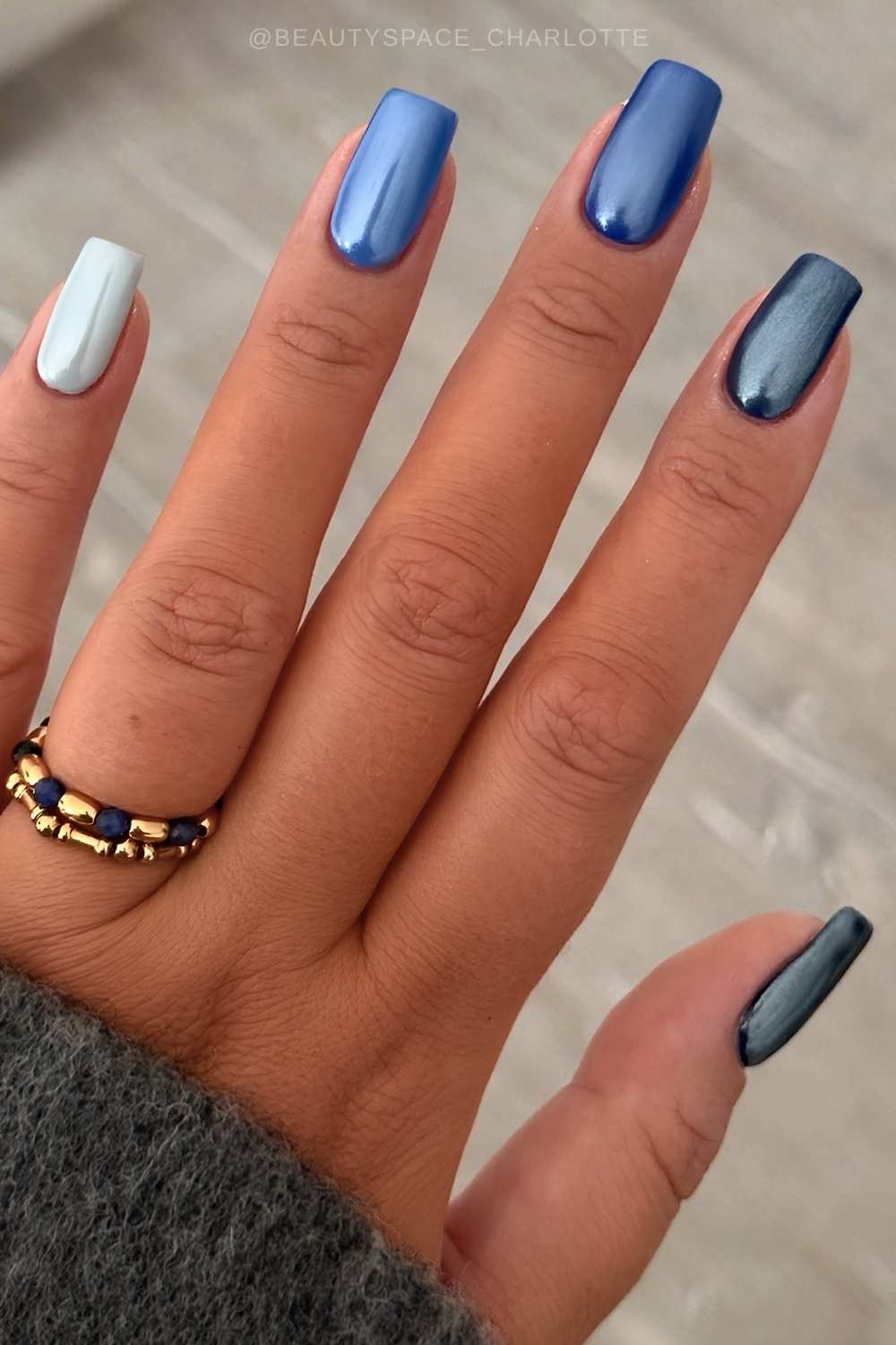 Chrome mani in different shades of blue