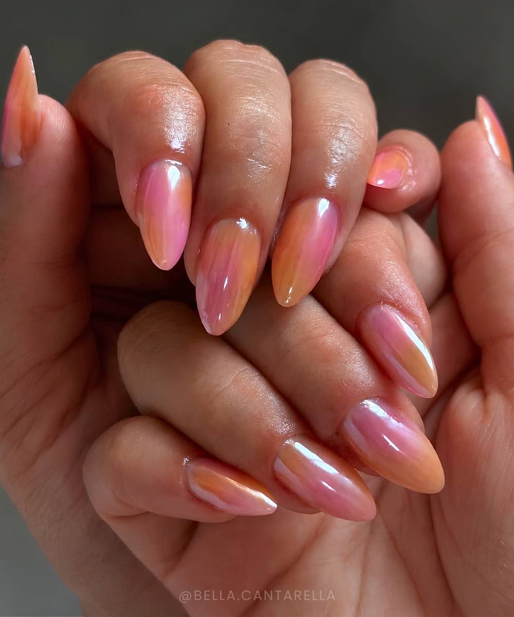 Chromed pink and orange gradient nails