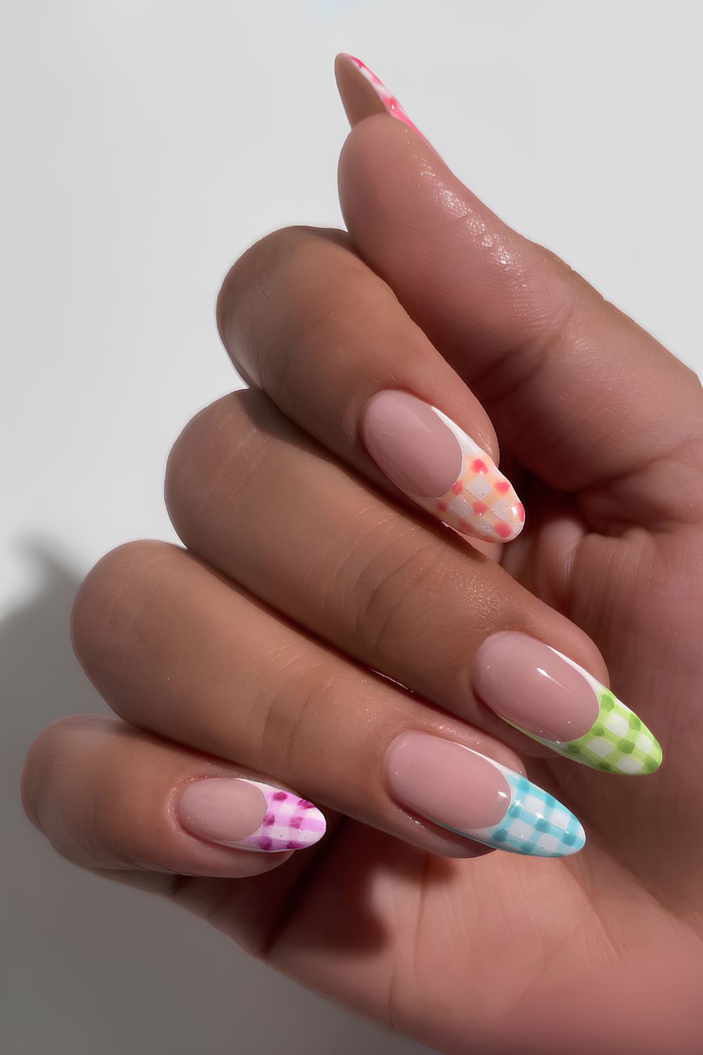 Colorful gingham French tip manicure
