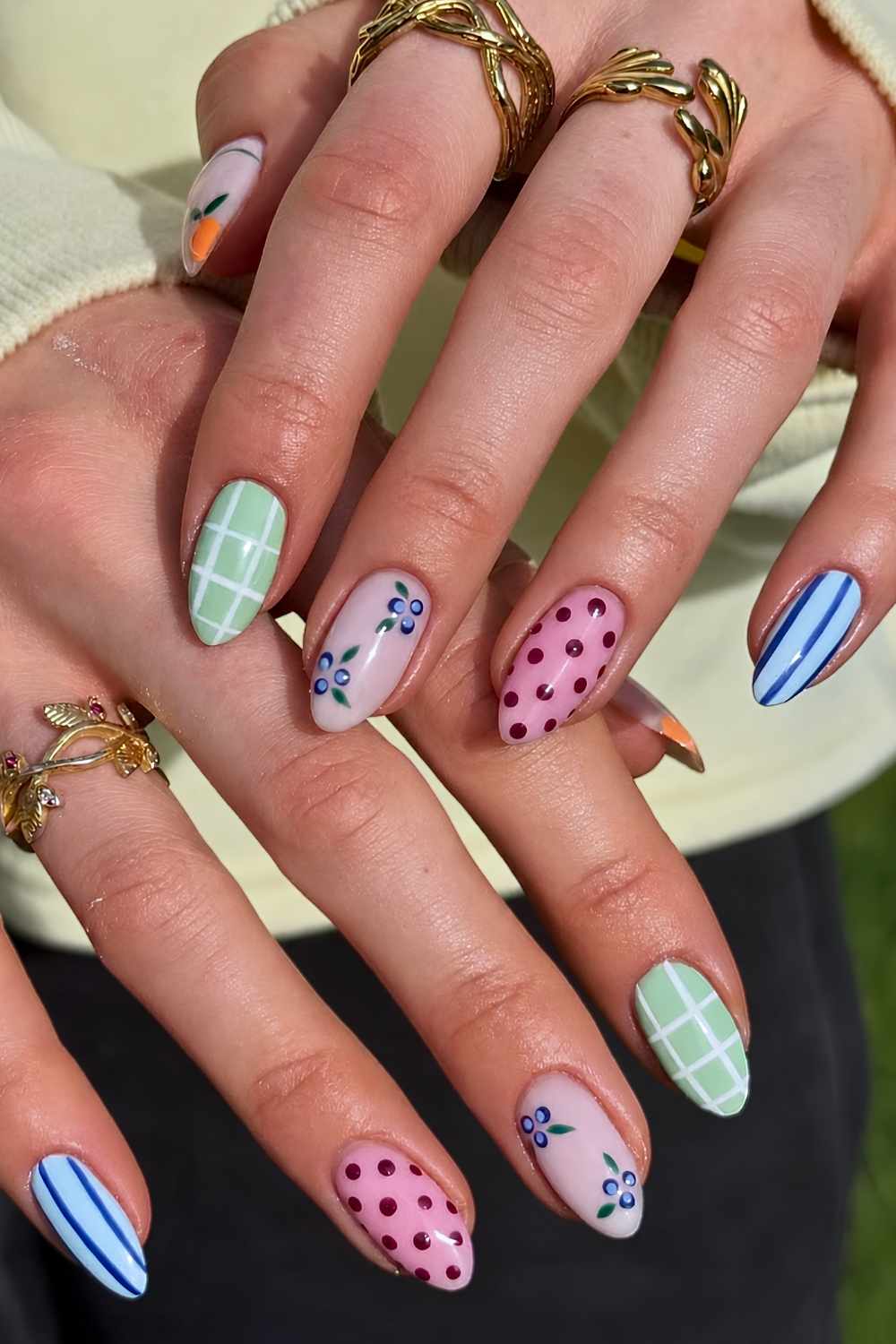 Colorful nails with dots and fruit art