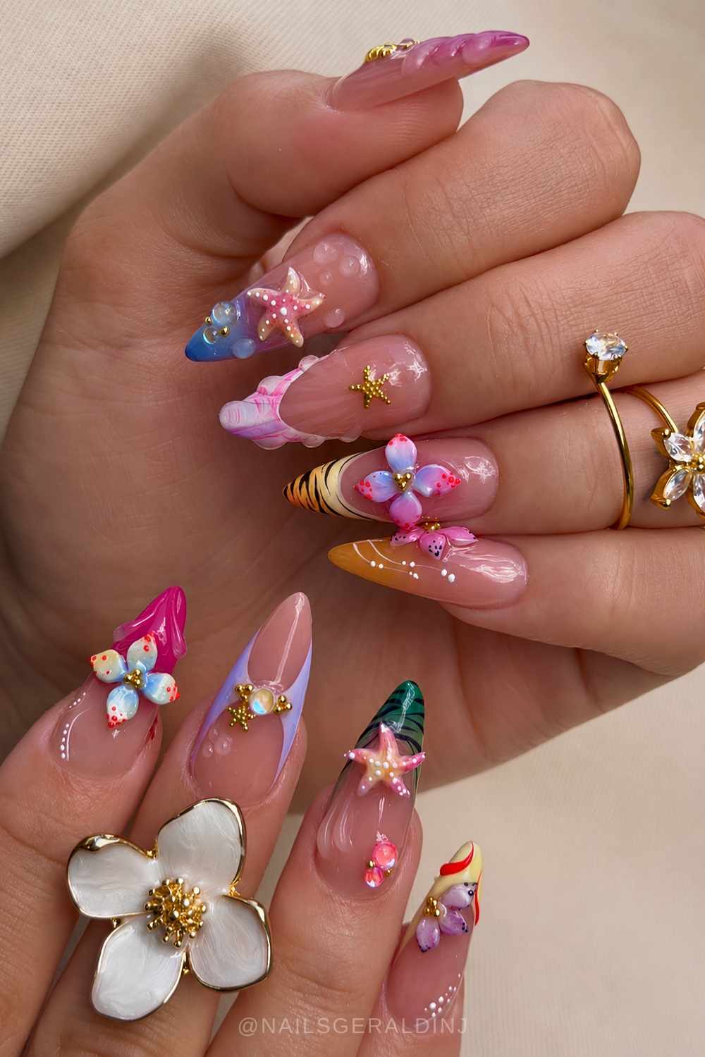 Colorful tropical nails with flowers and starfish
