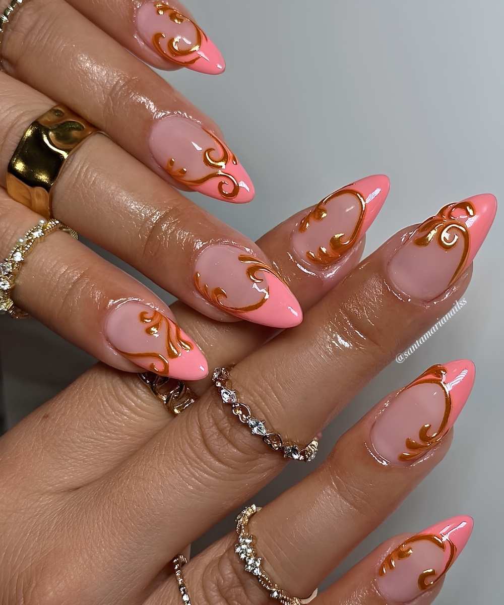 Coral French nails with accent gold swirls