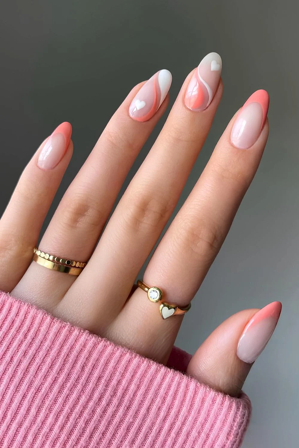 Coral and white nails with heart art