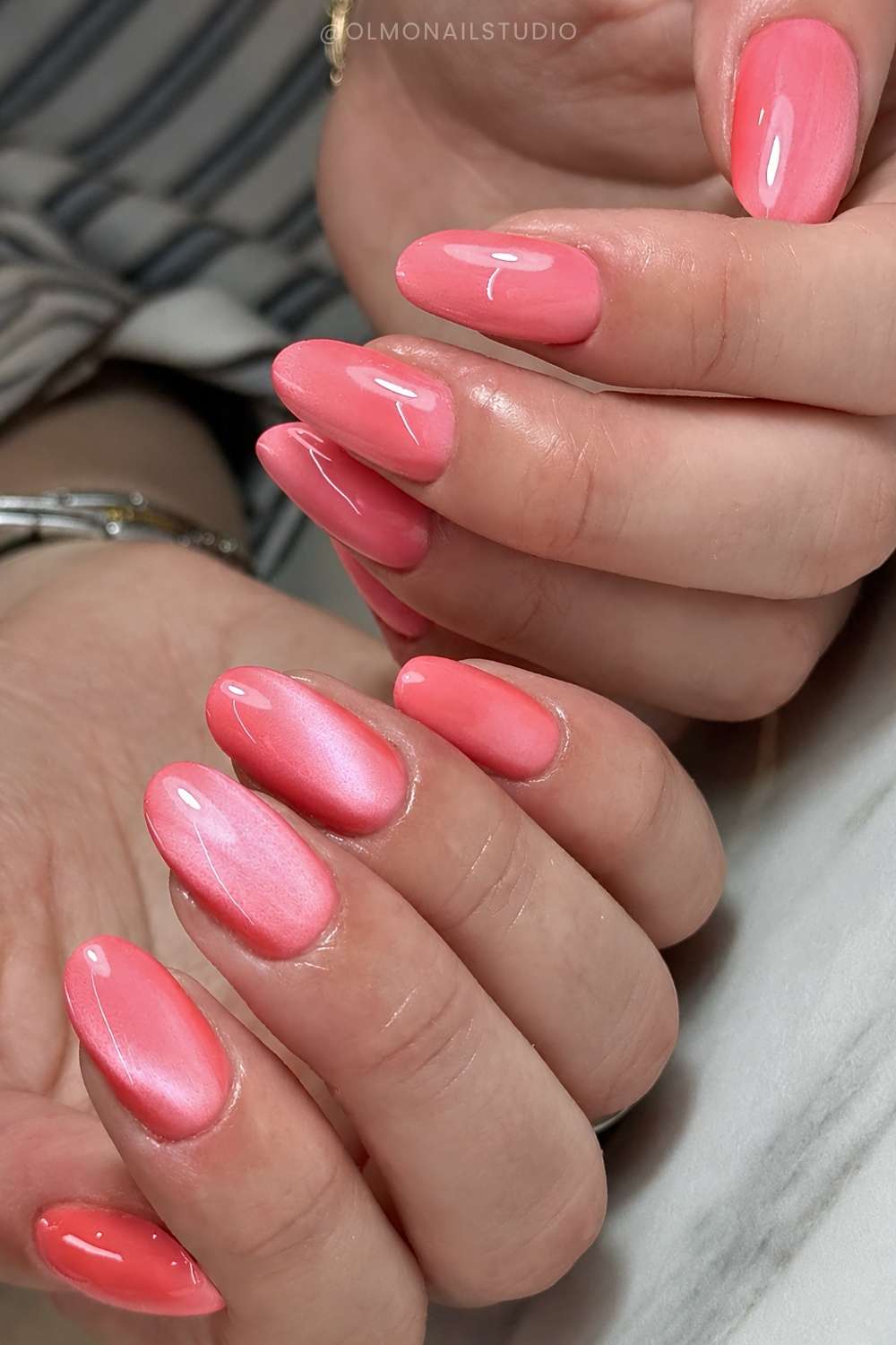 Coral cat eye manicure