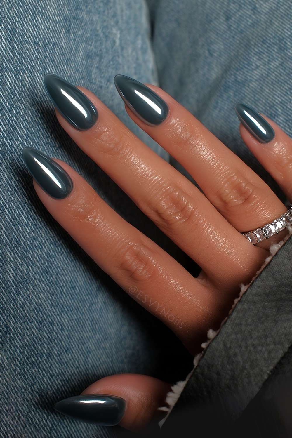 Dark blue chrome manicure