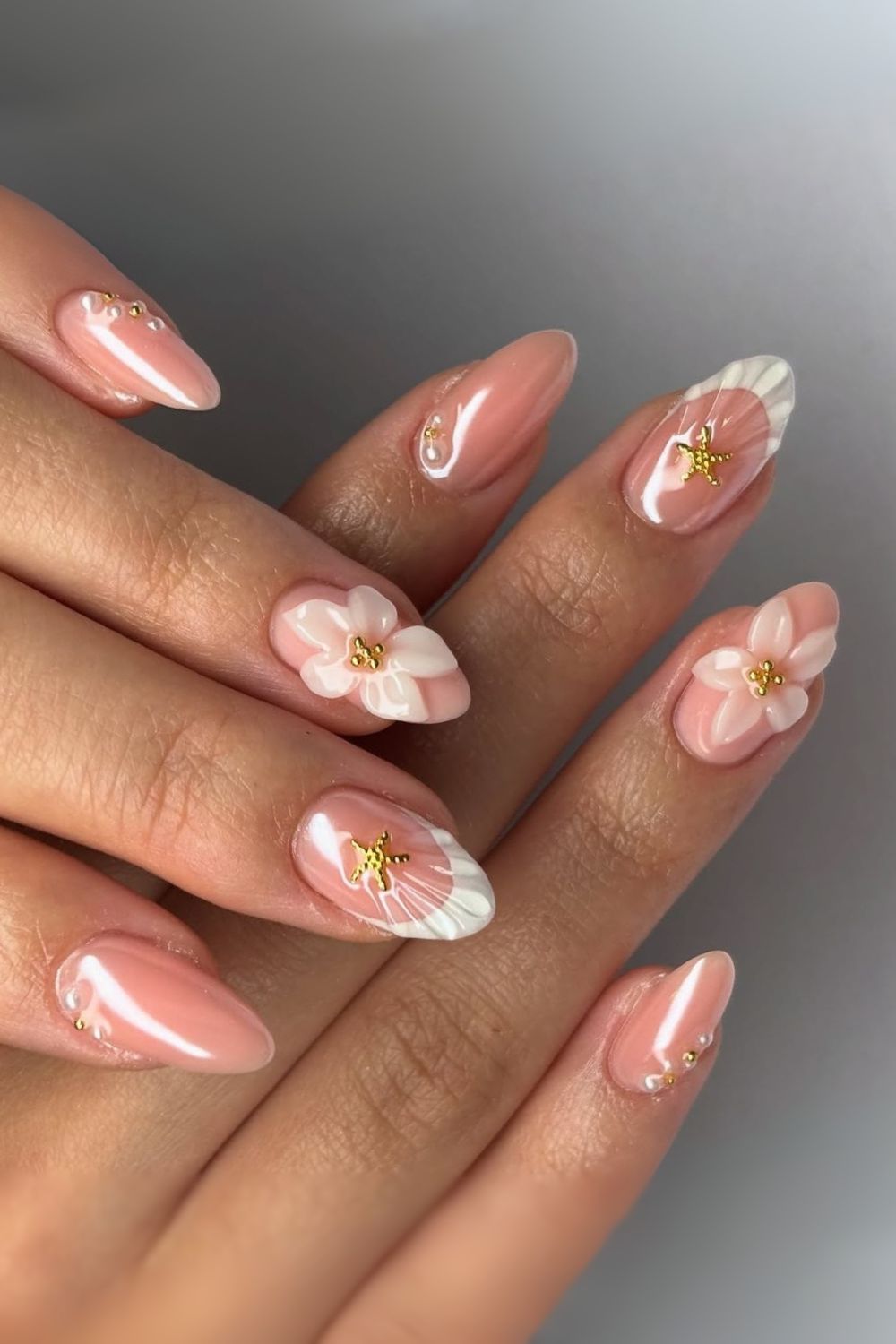 Glazed milky pink nails with white tips 3d floral design gold starfish and pearl charms