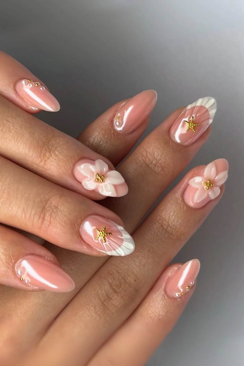 Glazed milky pink nails with white tips 3d floral design gold starfish and pearl charms