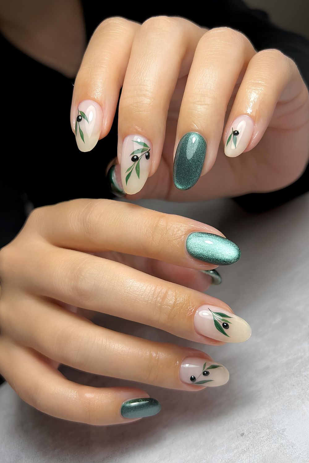 Green cat.eye mani with olive accents