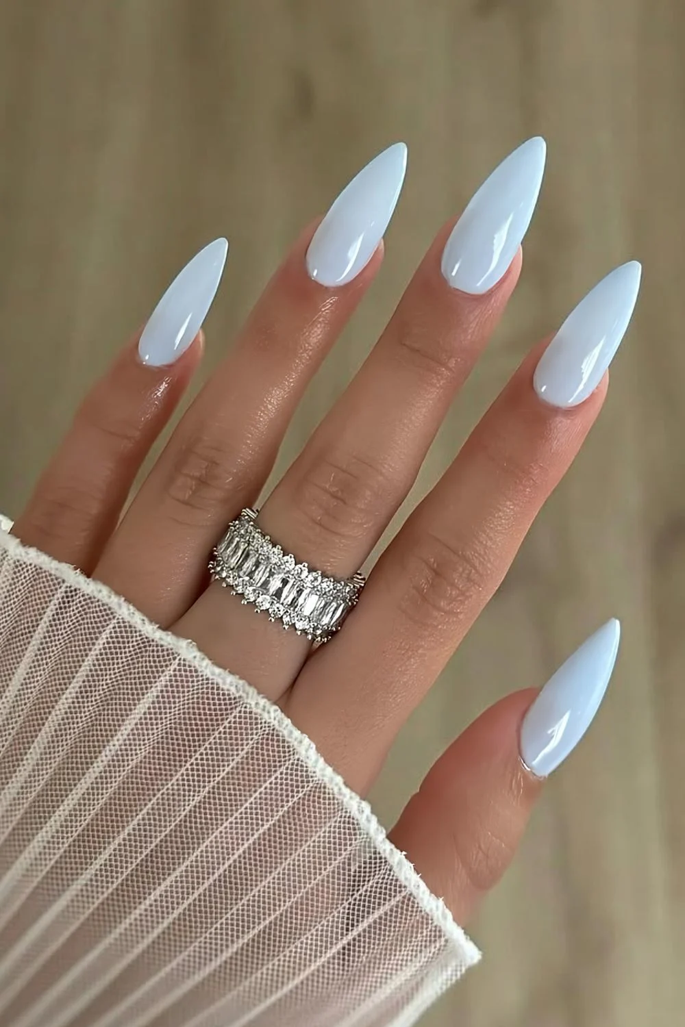 Light milky blue nails