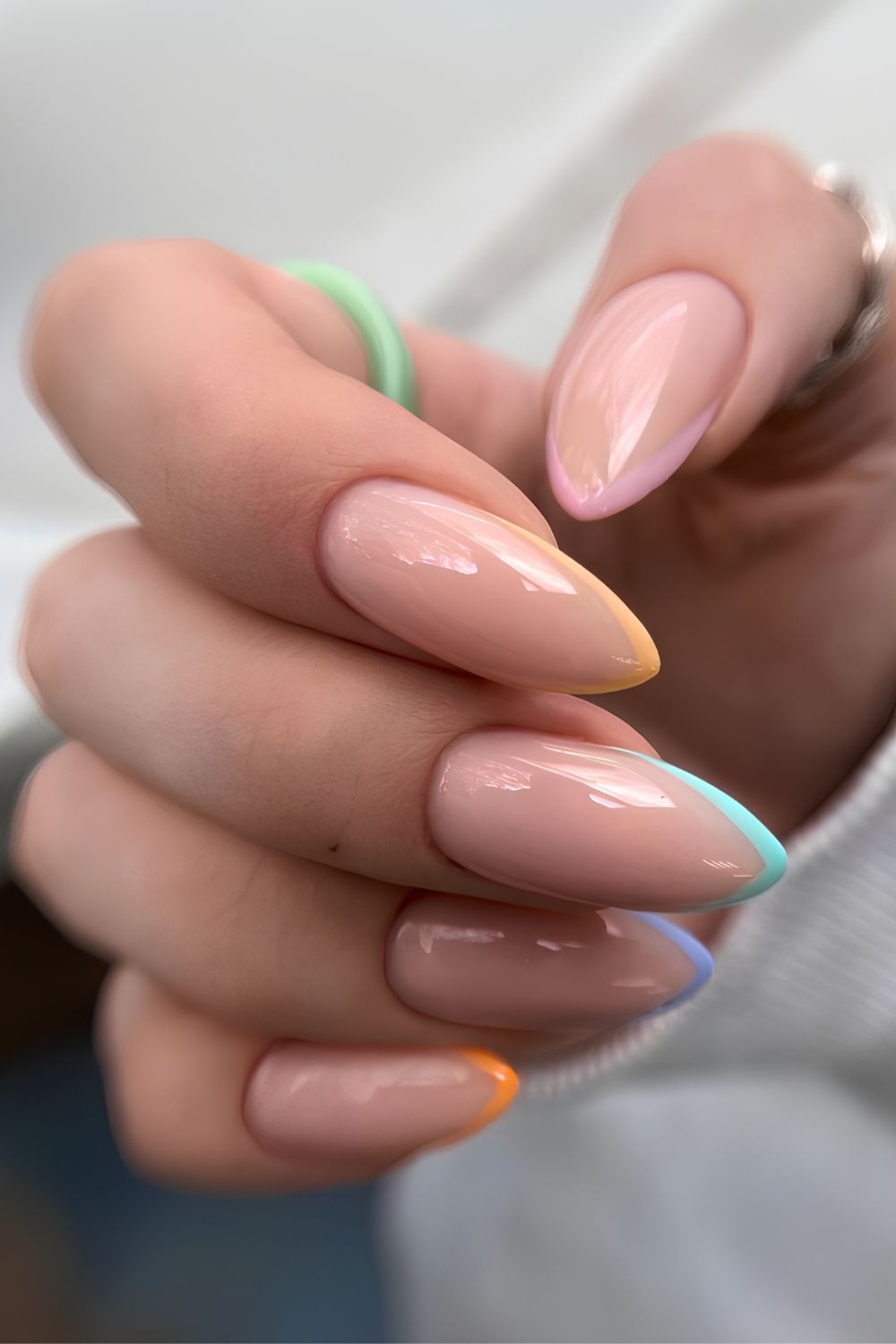 Micro colorful pointed French tip manicure