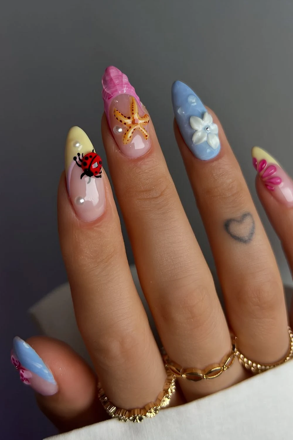 Mismatched 3d beach nails