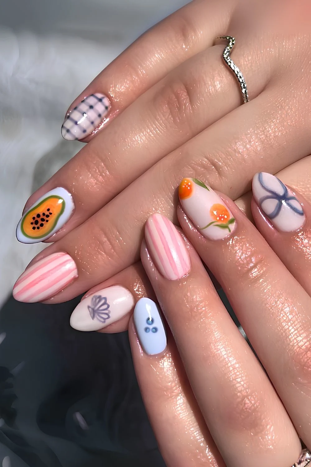 Mix and match nails with stripes and fruit art