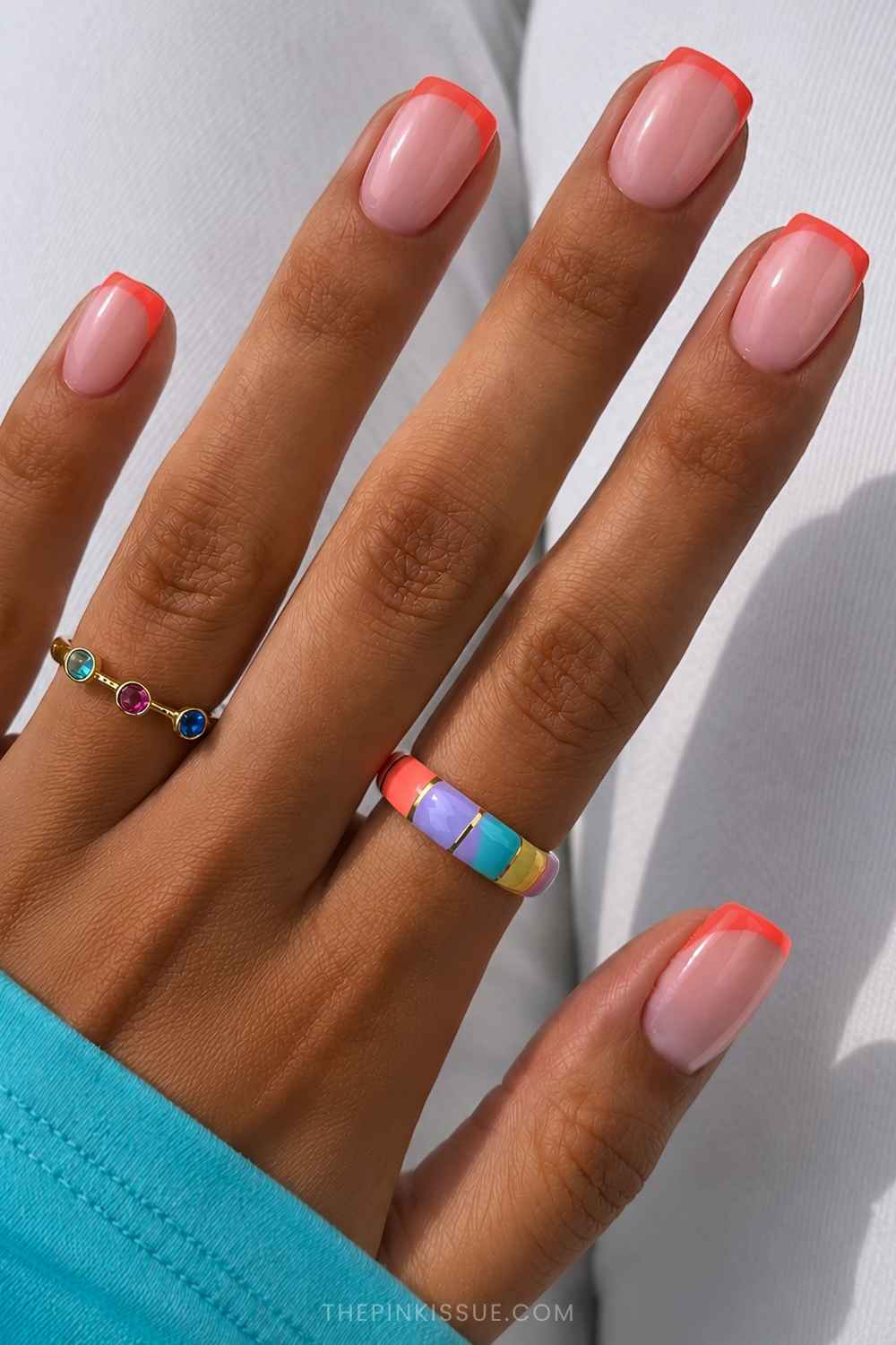 Neon coral micro French mani