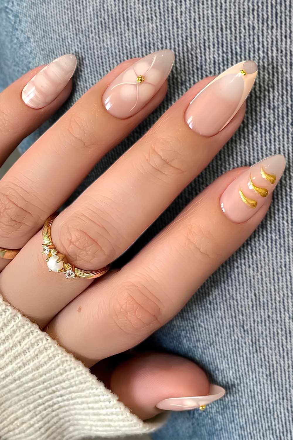 Neutral mix and match manicure with gold details
