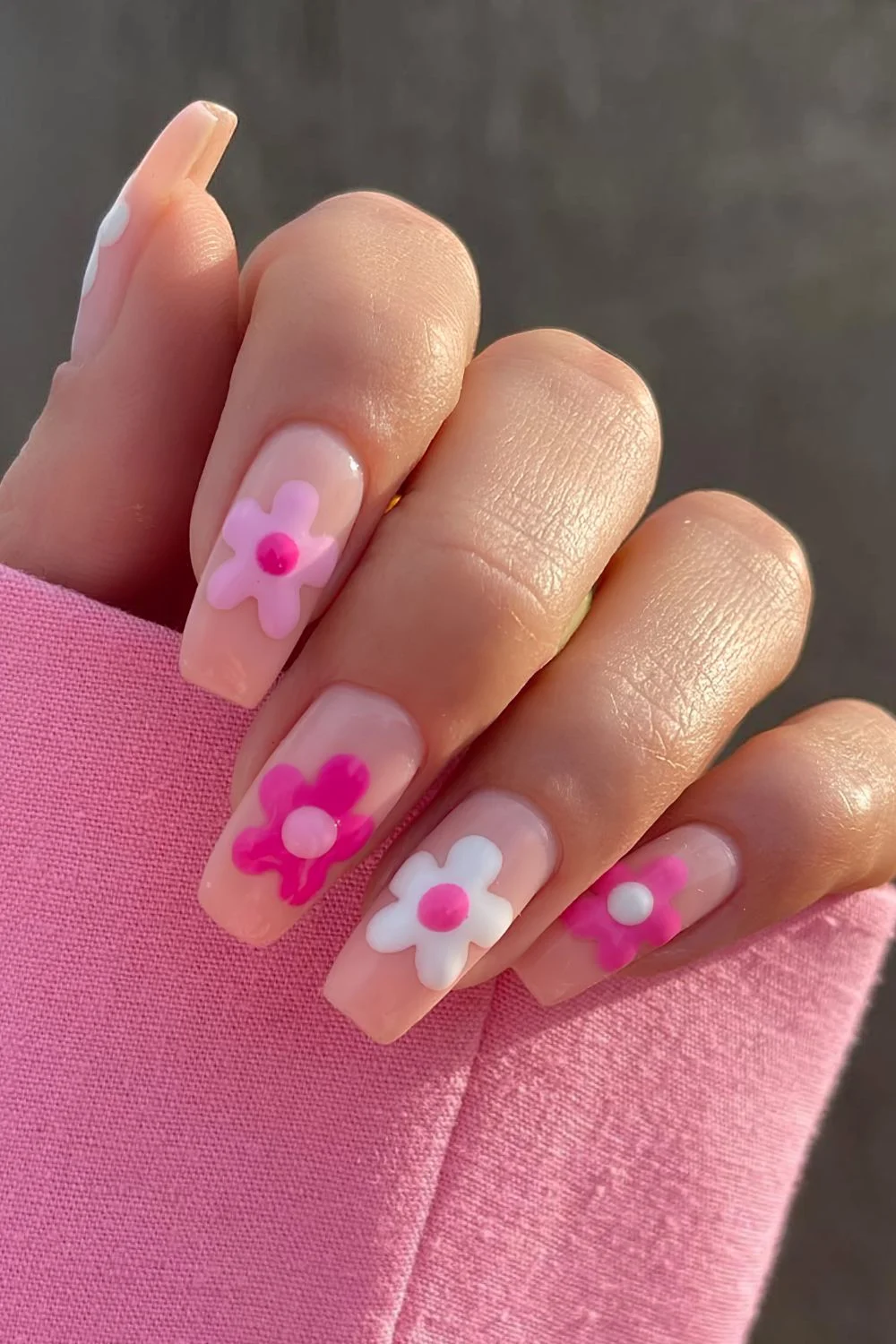 Neutral nails with pink and white chunky flowers
