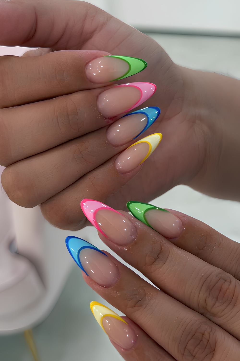 Outlined skittle French manicure